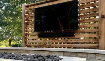outdoor TV by fire table